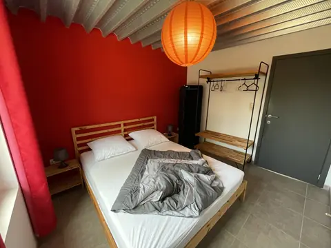 Slaapkamer op de begane grond van vakantiewoning 1
