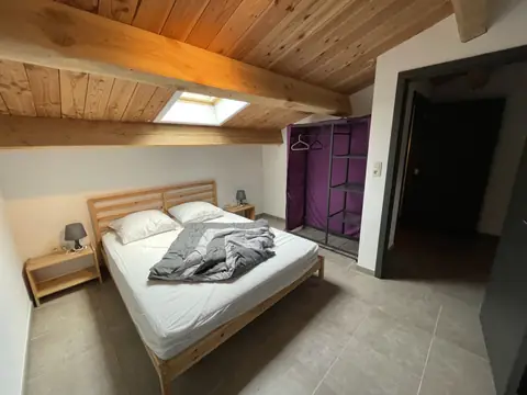 Tweede slaapkamer op de verdieping van vakantiewoning 1