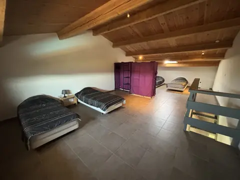 Slaapkamer met vier bedden van vakantiewoning 2