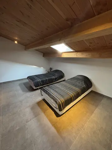 Ander uitzicht op de slaapkamer op de verdieping van vakantiewoning 2