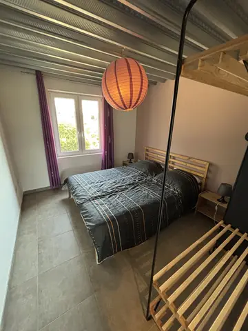 Tweepersoonsslaapkamer van vakantiewoning 2