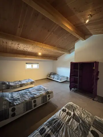 Ander uitzicht op de slaapkamer op de verdieping van vakantiewoning 3